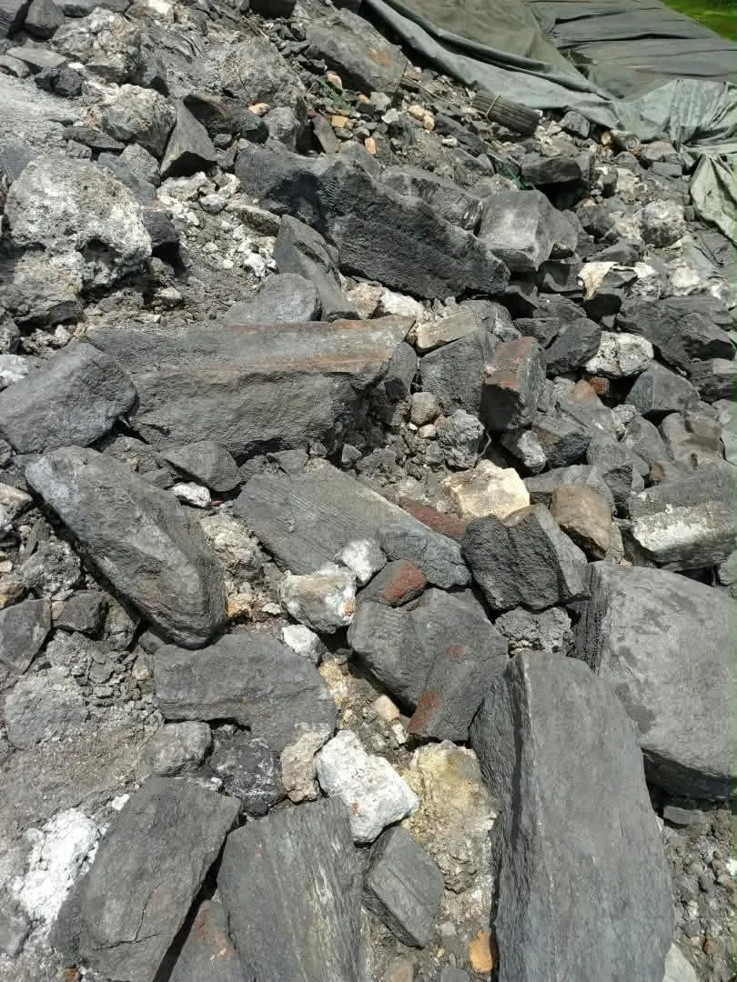 Heap of spent carbon cathode blocks and rubble